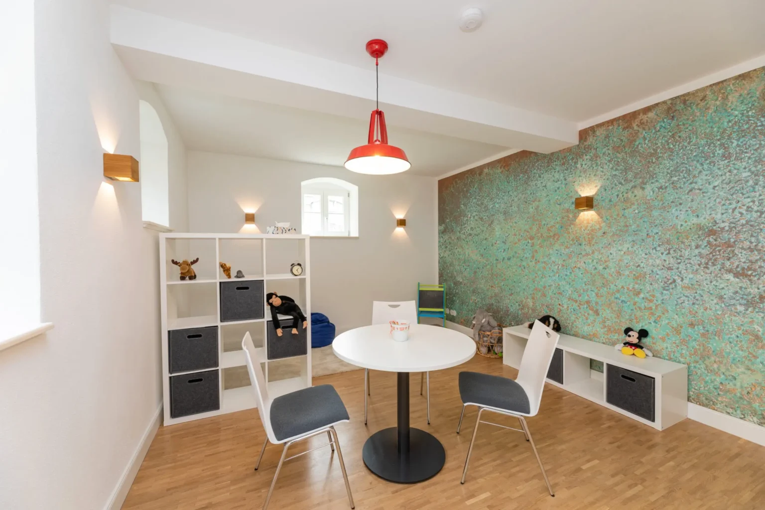 Therapieraum mit grüner Wand